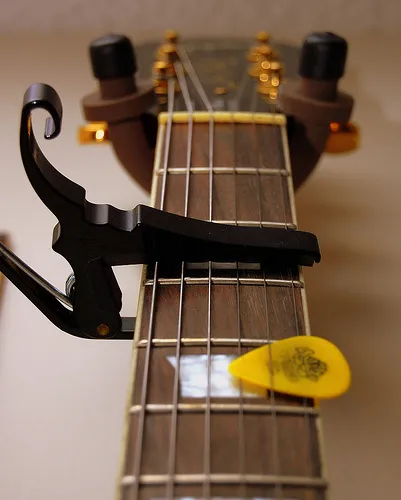 2/28/2008 outtake III by OctopusHat, on Flickr: http://www.flickr.com/photos/octopushat/2451899075/ guitar capo 3rd fret