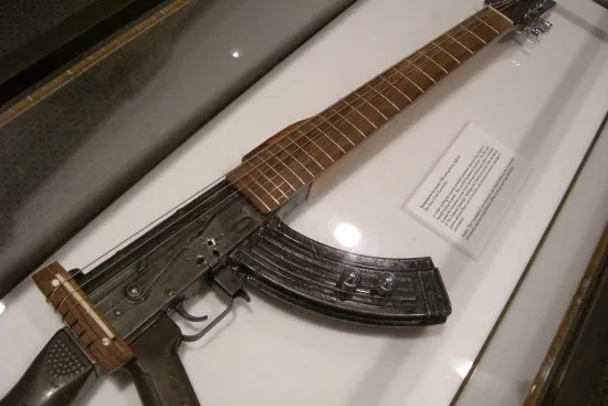 (image by WordRidden: http://www.flickr.com/photos/wordridden/990605760/) gun guitar